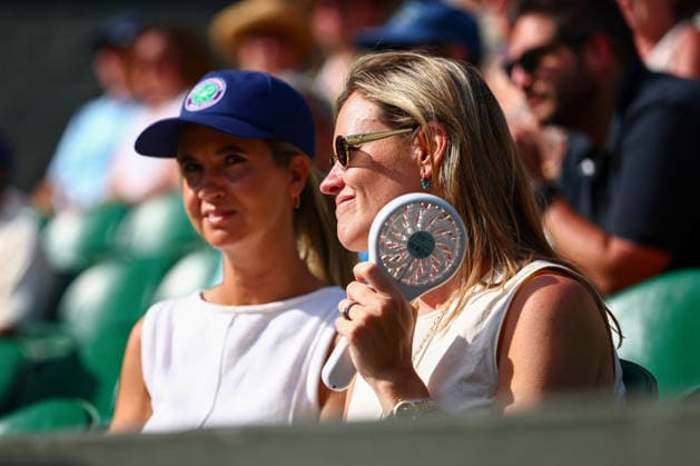 Spectators with fans Wimbledon Tennis Championships, Day 11, The All England Lawn Tennis and Croquet Club, London, UK - 09 Jul 2026London The All England Lawn Tennis and United Kingdom  Copyright: xJamesxMarsh Shutterstockx 16981021dy