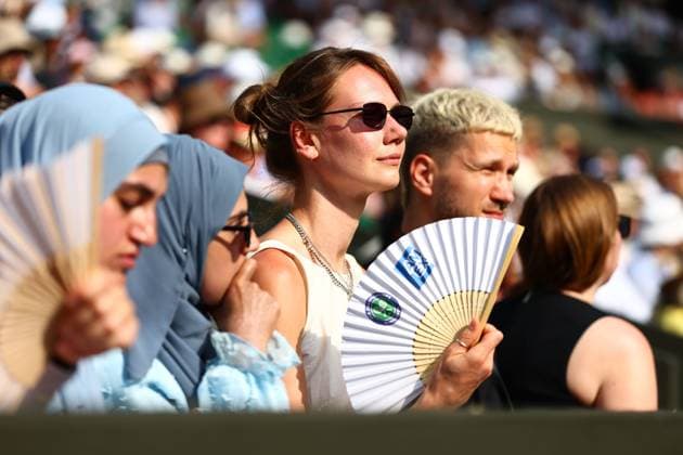 Spectators with fans Wimbledon Tennis Championships, Day 11, The All England Lawn Tennis and Croquet Club, London, UK - 09 Jul 2026London The All England Lawn Tennis and United Kingdom  Copyright: xJamesxMarsh Shutterstockx 16981021fi