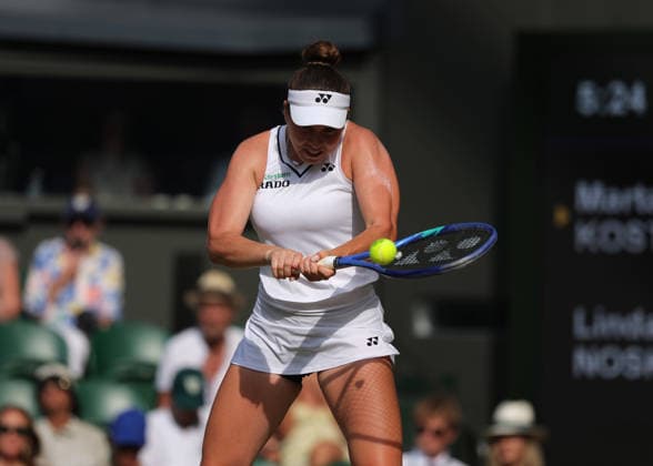 RECORD DATE NOT STATED 9th July 2026; All England Lawn Tennis and Croquet Club, London, England; Wimbledon Tennis Tournament, Day Eleven; Linda Noskova (CZE) with a backhand shot to Marta Kostyuk (UKR) JohnxPatrickxFletcher