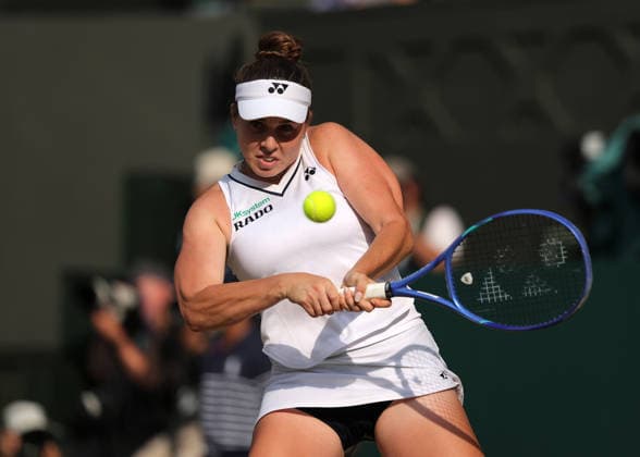 RECORD DATE NOT STATED 9th July 2026; All England Lawn Tennis and Croquet Club, London, England; Wimbledon Tennis Tournament, Day Eleven; Linda Noskova (CZE) with a backhand shot to Marta Kostyuk (UKR) JohnxPatrickxFletcher