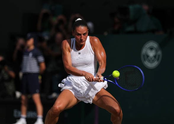 RECORD DATE NOT STATED 9th July 2026; All England Lawn Tennis and Croquet Club, London, England; Wimbledon Tennis Tournament, Day Eleven; Marta Kostyuk (UKR) with a backhand shot to Linda Noskova (CZE) JohnxPatrickxFletcher