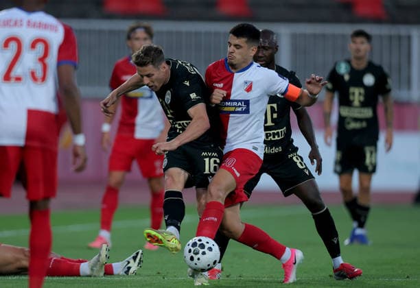 Vojvodina v Ferencvaros, UEFA Europa League first qualifying round, 1st leg, season 2026 2027 Novi Sad, Serbia. 9th July, 2026. Ferencvaros Kristoffer Zachariassen and Vojvodina s Dejan Zukic (R) during the UEFA Europa League first qualifying round first leg football match between Vojvodina and Ferencvaros on July 9. 2026. in Novi Sad, Serbia. Novi Sad Serbia Copyright: xPedjaxMilosavljevic STARSPORTx x