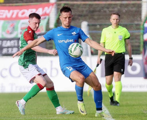 UEFA Europa Conference League First Qualifying Round First Leg, The Oval, Belfast 9 7 2026 Glentoran vs RFS Glentoran™s James Singleton with RFS™s Janis Ikaunieks James Singleton with Janis Ikaunieks 9 7 2026  Copyright: xx 090726JP3football006