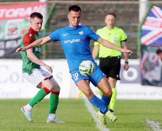 UEFA Europa Conference League First Qualifying Round First Leg, The Oval, Belfast 9 7 2026 Glentoran vs RFS Glentoran™s James Singleton with RFS™s Janis Ikaunieks James Singleton with Janis Ikaunieks 9 7 2026  Copyright: xx 090726JP3football007