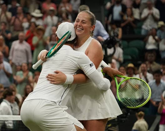 Tennis - 2026 Wimbledon Championships - Day Eleven (Week Two) - All England Lawn Tennis & Croquet Club, London - Thursday 8th July 2026 Centre Court : Mixed Doubles Final : Marc Polmans and Storm Hunter (AUS) v Marcelo Arevalo (ESA) and Jelena Ostapenko (LAT) Marcelo Arevalo (ESA) and Jelena Ostapenko (LAT) celebrate winning match point COLORSPORT ANDREW COWIE 