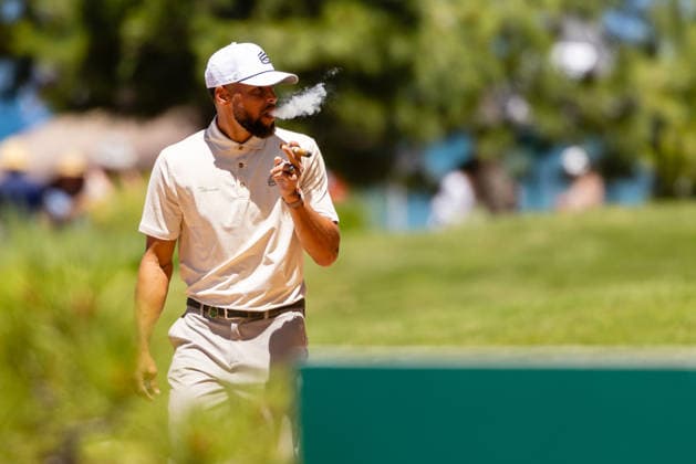 STATELINE, NV - JULY 09: Stephen Curry smokes a cigar on the 17th hole during the preview round of the American Century Championship on July 9, 2026 at Edgewood Tahoe Golf Course in Stateline, NV. (Photo by Matthew Huang Icon Sportswire) GOLF: JUL 09 American Century Championship EDITORIAL USE ONLY Icon260709060