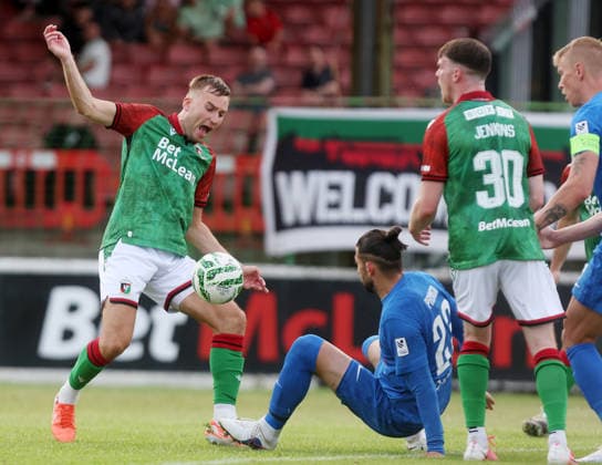 UEFA Europa Conference League First Qualifying Round First Leg, The Oval, Belfast 9 7 2026 Glentoran vs RFS Glentoran™s Daniel Larmour with RFS™s Herdi Prenga Daniel Larmour with Herdi Prenga 9 7 2026  Copyright: xx 090726JP3football027