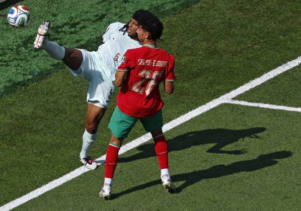 FIFA World Cup, WM, Weltmeisterschaft, Fussball 2026 quarterfinals - France vs Morocco Jules Kounde of France (L) and Anass Salah-Eddine of Morocco in action during the FIFA World Cup 2026 quarterfinals match France against Morocco, in Boston, USA, 09 July 2026. BOSTON United States  Copyright: xGREGxM.xCOOPERx