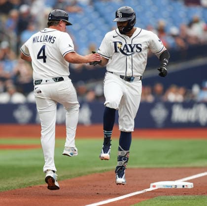 July 9, 2026, St. Petersburg, Florida, USA: Tampa Bay Rays third baseman JUNIOR CAMINERO (13) celebrates with Tampa Bay Rays third base coach BRADY WILLIAMS (4) after a home run against the New York Yankees. The Tampa Bay Rays hosted the New York Yankees at Tropicana Field in St. Petersburg, FL. MLB, Baseball Herren, USA 2026: New York Yankees 12:4 Tampa Bay Rays  - ZUMAm299 20260709_znp_m299_023 Copyright: xTaylorxMcFeex