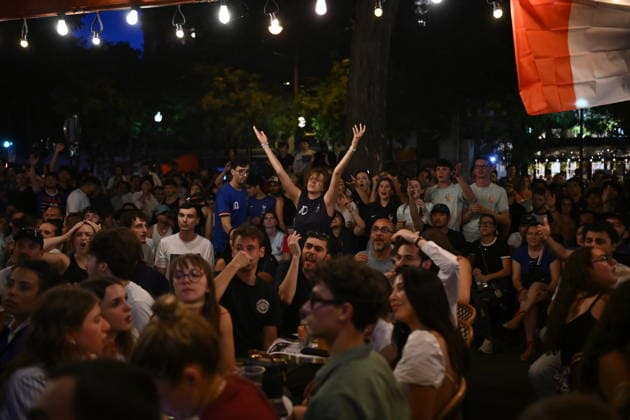 RECORD DATE NOT STATED French fans celebrate the French national team, Nationalteam Ä™s victory in the World Cup quarter-finals in Paris on 9 July 2026 - 09 07 2026 - France Ile-de-France (region) Paris -  JulienxMattiax xLexPictorium LePictorium_0338203