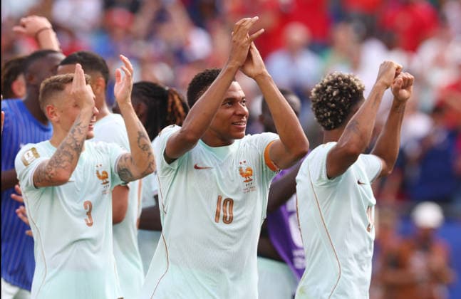 Kylian Mbappe of France celebrates with teammates after France defeated Morocco 2-0 in a Quarter-final FIFA World Cup, WM, Weltmeisterschaft, Fussball match against Morocco at Boston Stadium in Foxborough, Massachusetts, on Thursday, July 9, 2026. France advances to the semi-finals.  BOS20260709836 CHRISTIANxBRUNSKILL