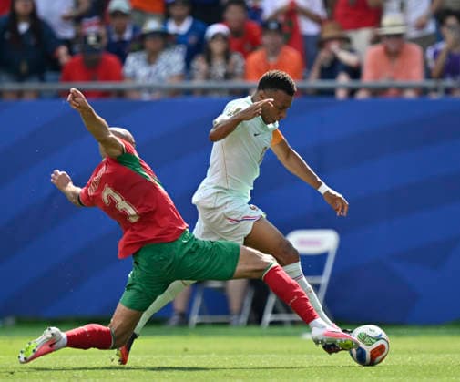 FOXBOROUGH, MASSACHUSETTS - JULY 9: Kylian MbappÃ of France wins a penalty after being fouled by Noussair Mazraoui of Morocco during the FIFA World Cup, WM, Weltmeisterschaft, Fussball 2026 Quarter Final match between France and Morocco at Boston Stadium on July 9, 2026 in Foxborough, Massachusetts.  Copyright: xMBxMediax