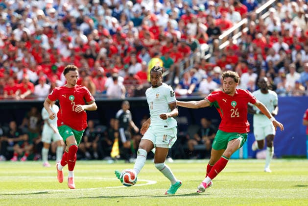 July 9, 2026; Foxborough, Massachusetts, USA; France forward Michael Olise (11) passes the ball past Morocco midfielder Neil El Aynaoui (24) in a quarterfinal match of the FIFA World Cup, WM, Weltmeisterschaft, Fussball 2026 between France and Morocco at Boston Stadium. (c) CSM - ZUMAc04_ 20260709_zma_c04_050 Copyright: xBurtxGranofskyx