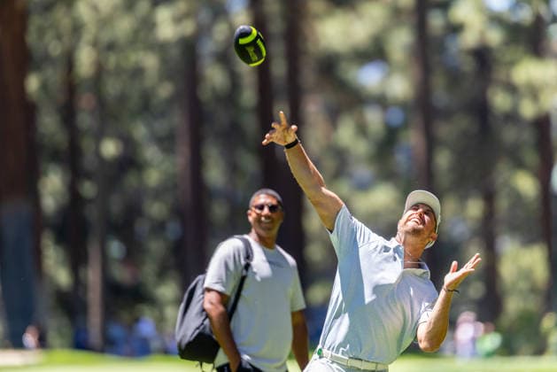 STATELINE, NV - JULY 09: Adam Thielen throws a football on the seventh hole during the preview round of the American Century Championship on July 9, 2026 at Edgewood Tahoe Golf Course in Stateline, NV. (Photo by Matthew Huang Icon Sportswire) GOLF: JUL 09 American Century Championship EDITORIAL USE ONLY Icon260709082