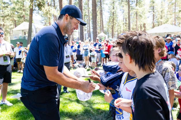 STATELINE, NV - JULY 09: Tony Romo signs autographs during the preview round of the American Century Championship on July 9, 2026 at Edgewood Tahoe Golf Course in Stateline, NV. (Photo by Matthew Huang Icon Sportswire) GOLF: JUL 09 American Century Championship EDITORIAL USE ONLY Icon260709091