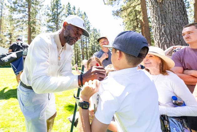STATELINE, NV - JULY 09: Jerry Rice signs autographs during the preview round of the American Century Championship on July 9, 2026 at Edgewood Tahoe Golf Course in Stateline, NV. (Photo by Matthew Huang Icon Sportswire) GOLF: JUL 09 American Century Championship EDITORIAL USE ONLY Icon260709094