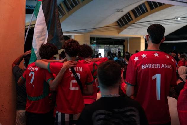 Moroccan fans in Bologna for France vs Morocco BOLOGNA, ITALY JULY 9, 2026: Moroccan football fans gather in Piazza Lucio Dalla in Bologna to watch the FIFA World Cup, WM, Weltmeisterschaft, Fussball quarter-final between Morocco and France on a giant screen. Several hundred supporters cheered on the Atlas Lions as Morocco was defeated 2 0 by France, ending its World Cup campaign. Bologna Italy Copyright: x xLeonardoxGaravagliax xJNAxPressx