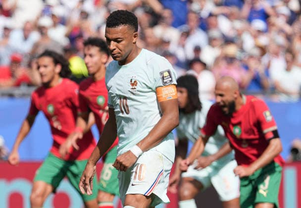 260710 -- BOSTON, July 10, 2026 -- Kylian Mbappe of France reacts after missing a chance to score during the quarter final match between France and Morocco at the 2026 FIFA World Cup, WM, Weltmeisterschaft, Fussball at Boston Stadium in Boston, the United States, July 9, 2026. SPU.S.-BOSTON-FOOTBALL-FIFA WORLD CUP-QUARTER FINAL-FRA VS MAR LuixSiuxWai  (SP)U.S.-BOSTON-FOOTBALL-FIFA WORLD CUP-QUARTER FINAL-FRA VS MAR IMAGO LuixSiuxWai  imago images 0861206069