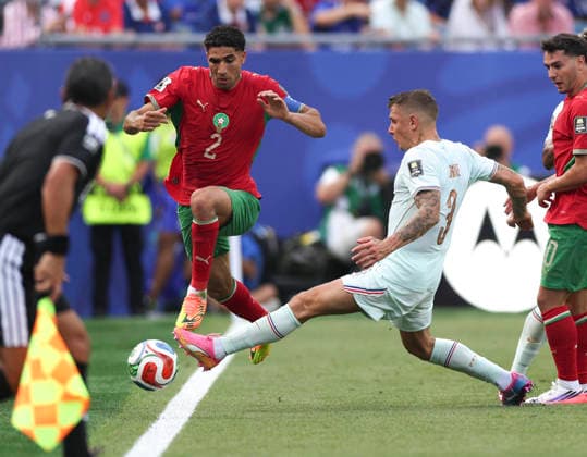 260710 -- BOSTON, July 10, 2026 -- Achraf Hakimi L of Morocco vies with Lucas Digne C of France during the quarter final match between France and Morocco at the 2026 FIFA World Cup, WM, Weltmeisterschaft, Fussball at Boston Stadium in Boston, the United States, July 9, 2026. SPU.S.-BOSTON-FOOTBALL-FIFA WORLD CUP-QUARTER FINAL-FRA VS MAR XuxZijian  (SP)U.S.-BOSTON-FOOTBALL-FIFA WORLD CUP-QUARTER FINAL-FRA VS MAR IMAGO XuxZijian  imago images 0861207369