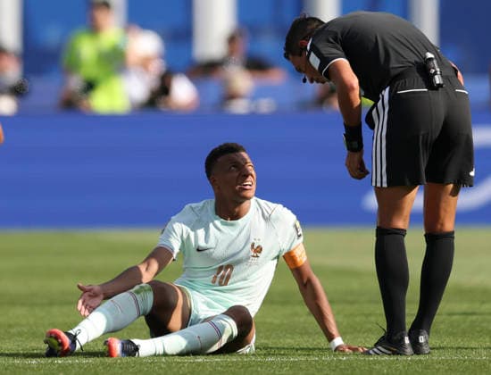 260710 -- BOSTON, July 10, 2026 -- Kylian Mbappe L of France talks with referee during the quarter final match between France and Morocco at the 2026 FIFA World Cup, WM, Weltmeisterschaft, Fussball at Boston Stadium in Boston, the United States, July 9, 2026. SPU.S.-BOSTON-FOOTBALL-FIFA WORLD CUP-QUARTER FINAL-FRA VS MAR ZhangxChen  (SP)U.S.-BOSTON-FOOTBALL-FIFA WORLD CUP-QUARTER FINAL-FRA VS MAR IMAGO ZhangxChen  imago images 0861209116