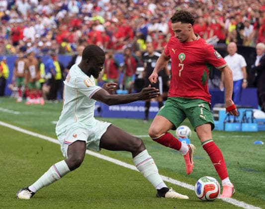 260710 -- BOSTON, July 10, 2026 -- Dayot Upamecano L of France vies with Chemsdine Talbi of Morocco during the quarter final match between France and Morocco at the 2026 FIFA World Cup, WM, Weltmeisterschaft, Fussball at Boston Stadium in Boston, the United States, July 9, 2026. SPU.S.-BOSTON-FOOTBALL-FIFA WORLD CUP-QUARTER FINAL-FRA VS MAR LuixSiuxWai  (SP)U.S.-BOSTON-FOOTBALL-FIFA WORLD CUP-QUARTER FINAL-FRA VS MAR IMAGO LuixSiuxWai  imago images 0861210026