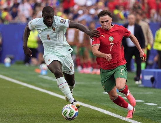 260710 -- BOSTON, July 10, 2026 -- Dayot Upamecano L of France vies with Chemsdine Talbi of Morocco during the quarter final match between France and Morocco at the 2026 FIFA World Cup, WM, Weltmeisterschaft, Fussball at Boston Stadium in Boston, the United States, July 9, 2026. SPU.S.-BOSTON-FOOTBALL-FIFA WORLD CUP-QUARTER FINAL-FRA VS MAR LuixSiuxWai  (SP)U.S.-BOSTON-FOOTBALL-FIFA WORLD CUP-QUARTER FINAL-FRA VS MAR IMAGO LuixSiuxWai  imago images 0861210029