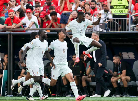 260710 -- BOSTON, July 10, 2026 -- Ousmane Dembele top of France celebrates scoring with his teammates during the quarter final match between France and Morocco at the 2026 FIFA World Cup, WM, Weltmeisterschaft, Fussball at Boston Stadium in Boston, the United States, July 9, 2026. SPU.S.-BOSTON-FOOTBALL-FIFA WORLD CUP-QUARTER FINAL-FRA VS MAR ZhangxChen  (SP)U.S.-BOSTON-FOOTBALL-FIFA WORLD CUP-QUARTER FINAL-FRA VS MAR IMAGO ZhangxChen  imago images 0861210031