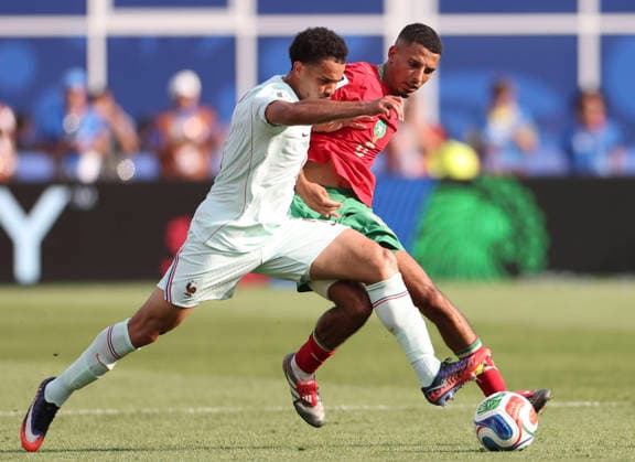 260710 -- BOSTON, July 10, 2026 -- Warren Zaire Emery L of France vies with Azzedine Ounahi of Morocco during the quarter final match between France and Morocco at the 2026 FIFA World Cup, WM, Weltmeisterschaft, Fussball at Boston Stadium in Boston, the United States, July 9, 2026. SPU.S.-BOSTON-FOOTBALL-FIFA WORLD CUP-QUARTER FINAL-FRA VS MAR ZhangxChen  (SP)U.S.-BOSTON-FOOTBALL-FIFA WORLD CUP-QUARTER FINAL-FRA VS MAR IMAGO ZhangxChen  imago images 0861210650