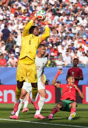 260710 -- BOSTON, July 10, 2026 -- Mike Maignan front, goalkeeper of France makes a save during the quarter final match between France and Morocco at the 2026 FIFA World Cup, WM, Weltmeisterschaft, Fussball at Boston Stadium in Boston, the United States, July 9, 2026. SPU.S.-BOSTON-FOOTBALL-FIFA WORLD CUP-QUARTER FINAL-FRA VS MAR LuixSiuxWai  (SP)U.S.-BOSTON-FOOTBALL-FIFA WORLD CUP-QUARTER FINAL-FRA VS MAR IMAGO LuixSiuxWai  imago images 0861210680