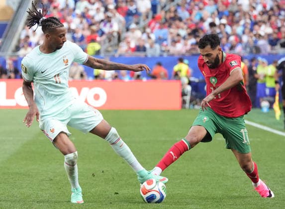 260710 -- BOSTON, July 10, 2026 -- Michael Olise L of France vies with Amine Sbai of Morocco during the quarter final match between France and Morocco at the 2026 FIFA World Cup, WM, Weltmeisterschaft, Fussball at Boston Stadium in Boston, the United States, July 9, 2026. SPU.S.-BOSTON-FOOTBALL-FIFA WORLD CUP-QUARTER FINAL-FRA VS MAR LuixSiuxWai  (SP)U.S.-BOSTON-FOOTBALL-FIFA WORLD CUP-QUARTER FINAL-FRA VS MAR IMAGO LuixSiuxWai  imago images 0861210746