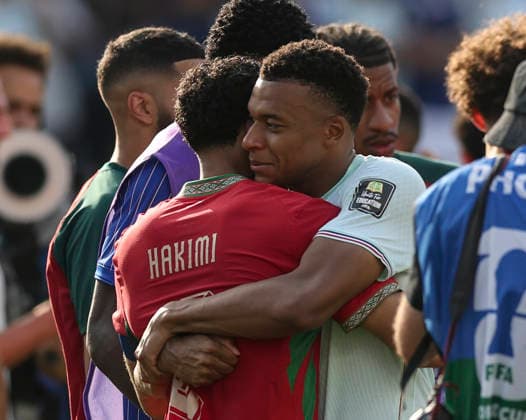 (260710) -- BOSTON, July 10, 2026 -- Kylian Mbappe (R) of France hugs Achraf Hakimi of Morocco after the quarter final match between France and Morocco at the 2026 FIFA World Cup, WM, Weltmeisterschaft, Fussball at Boston Stadium in Boston, the United States, July 9, 2026. ) (SP)U.S.-BOSTON-FOOTBALL-FIFA WORLD CUP-QUARTER FINAL-FRA VS MAR HuxXingyu 