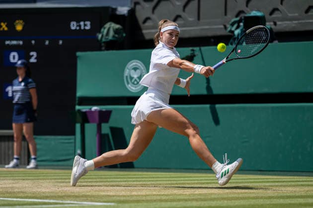 (260710) -- LONDON, July 10, 2026 -- Karolina Muchova of the Czech Republic hits a return during the women s semifinal match against Coco Gauff of the United States at the Wimbledon Tennis Championships in London, Britain, on July 9, 2026. (Photo by Xinhua) (SP)BRITAIN-LONDON-TENNIS-WIMBLEDON-WOMEN S SINGLES StephenxChung 