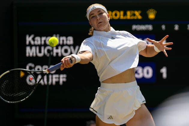 (260710) -- LONDON, July 10, 2026 -- Karolina Muchova of the Czech Republic hits a return during the women s semifinal match against Coco Gauff of the United States at the Wimbledon Tennis Championships in London, Britain, on July 9, 2026. (Photo by Xinhua) (SP)BRITAIN-LONDON-TENNIS-WIMBLEDON-WOMEN S SINGLES StephenxChung 