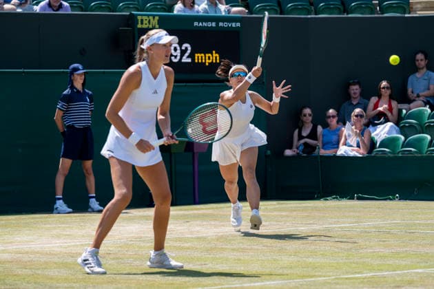 (260710) -- LONDON, July 10, 2026 -- Guo Hanyu (R) Kristina Mladenovic compete during the women s doubles quarterfinal match between Katerina Siniakova (the Czech Republic) Taylor Townsend (the United States of America) and Guo Hanyu (China) Kristina Mladenovic (France) at the Wimbledon Tennis Championships in London, Britain, on July 9, 2026. (Photo by Xinhua) (SP)BRITAIN-LONDON-TENNIS-WIMBLEDON-WOMEN S DOUBLES StephenxChung 