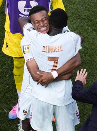 Football: 2026 World Cup France s Ousmane Dembele (7) hugs teammate Kylian Mbappe after scoring the team s second goal in the second half of a World Cup quarterfinal football match against Morocco at Boston Stadium in Foxborough, Massachusetts, on July 9, 2026.  A14AA0005622487P