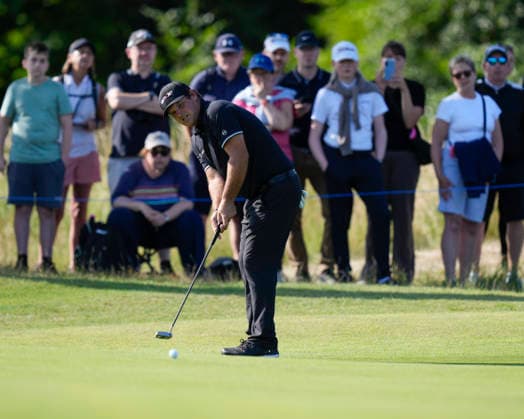 NORTH BERWICK, SCOTLAND - JULY 10: Patrick Reed putts on the tenth green during Round 2 of the Genesis Scottish Open at the Renaissance Club, North Berwick on July 10, 2026 in North Berwick, Scotland Genesis Scottish Open Round 2