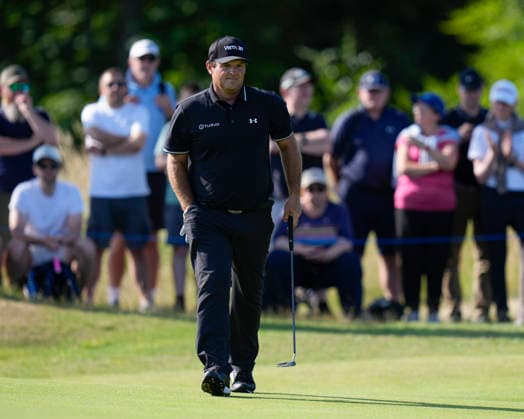 NORTH BERWICK, SCOTLAND - JULY 10: Patrick Reed walks onto the eleventh green during Round 2 of the Genesis Scottish Open at the Renaissance Club, North Berwick on July 10, 2026 in North Berwick, Scotland Genesis Scottish Open Round 2