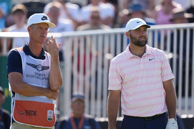 NORTH BERWICK, SCOTLAND - JULY 10: Scottie Scheffler and caddie Ted Scott discuss the yardage on the 15th tee during Round 2 of the Genesis Scottish Open at the Renaissance Club, North Berwick on July 10, 2026 in North Berwick, Scotland Genesis Scottish Open Round 2
