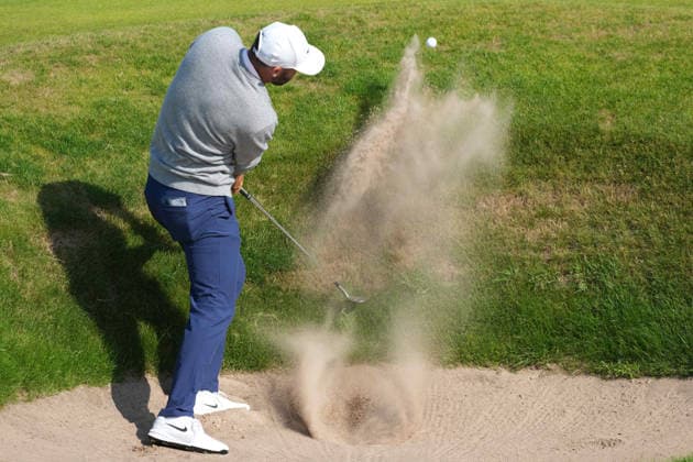 RECORD DATE NOT STATED 10th July 2026; The Renaissance Club, North Berwick, East Lothian, Scotland: Genesis Scottish Open Golf, Day Two; Scottie Scheffler plays out of a greenside bunker on the 11th hole during the second round of the Genesis Scottish Open AlecxBrown