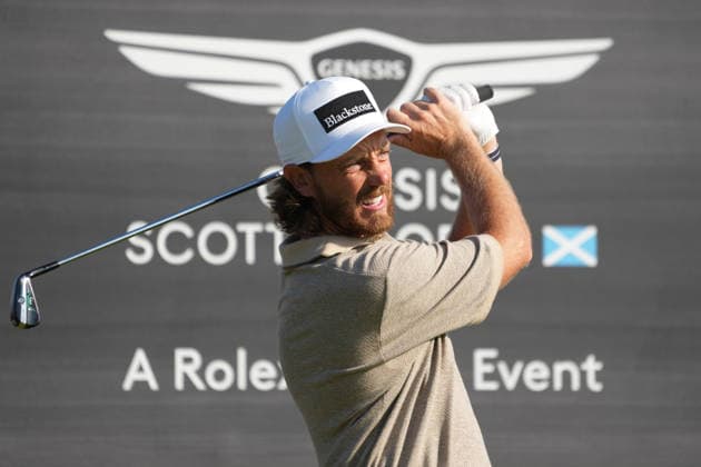 RECORD DATE NOT STATED 10th July 2026; The Renaissance Club, North Berwick, East Lothian, Scotland: Genesis Scottish Open Golf, Day Two; Tommy Fleetwood makes a practice swing in front of Genesis Scottish Open branding on the 10th tee during the second round of the Genesis Scottish Open AlecxBrown