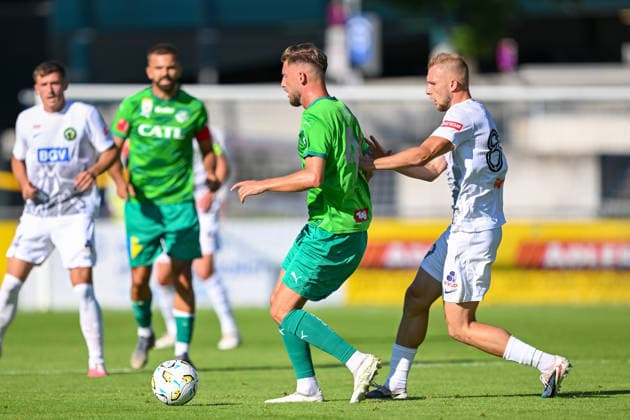 SOCCER - Wattens vs Zhytomyr, test match SCHWAZ,AUSTRIA,10.JUL.26 - SOCCER - ADMIRAL Bundesliga, Premier League, WSG Tirol vs FC Polissya Zhytomyr, test match. Image shows Nemanja Celic (Wattens) and Mykola Haiduchyk (Zhytomyr).  GEPAxpictures xDanielxSchoenherr