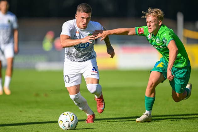 SOCCER - Wattens vs Zhytomyr, test match SCHWAZ,AUSTRIA,10.JUL.26 - SOCCER - ADMIRAL Bundesliga, Premier League, WSG Tirol vs FC Polissya Zhytomyr, test match. Image shows Vladyslav Veleten (Zhytomyr) and Raphael Gschoesser (Wattens).  GEPAxpictures xDanielxSchoenherr