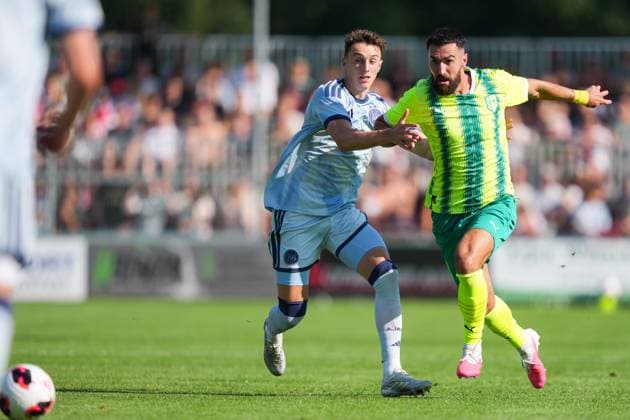 HULSHORST , 10-07-2026, Sportpark De Eendracht , season 2026 2027 , Pre season football . Match between Ajax and AEK Larnaca , Picture shows Ajax player Youri Baas and Riad Bajic Ajax - AEK Larnaca (friendly)  x204963018x Copyright: