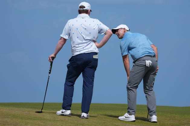 RECORD DATE NOT STATED 10th July 2026; The Renaissance Club, North Berwick, East Lothian, Scotland: Genesis Scottish Open Golf, Day Two; Rory McIlroy and Robert MacIntyre talk on the 3rd green during the second round of the Genesis Scottish Open AlecxBrown