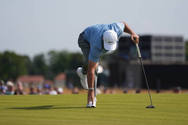 RECORD DATE NOT STATED 10th July 2026; The Renaissance Club, North Berwick, East Lothian, Scotland: Genesis Scottish Open Golf, Day Two; Rory McIlroy sinks a putt for birdie on the 8th hole and pulls his ball out of the cup at The Renaissance Club during the second round of the Genesis Scottish Open AlecxBrown