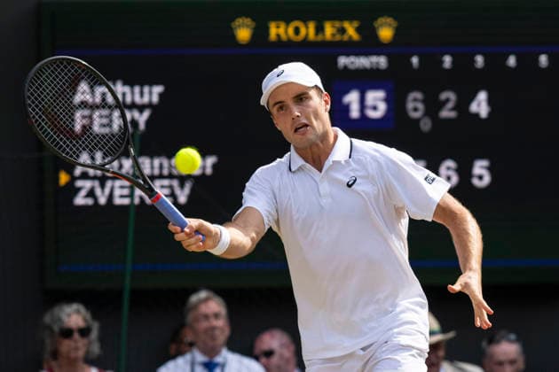 (260711) -- LONDON, July 11, 2026 -- Arthur Fery hits a return during the men s singles semifinal between Arthur Fery of Britain and Alexander Zverev of Germany at the Wimbledon Tennis Championships in London, Britain, on July 10, 2026. (Photo by Xinhua) (SP)BRITAIN-LONDON-TENNIS-WIMBLEDON-MEN S SINGLES StephenxChung 