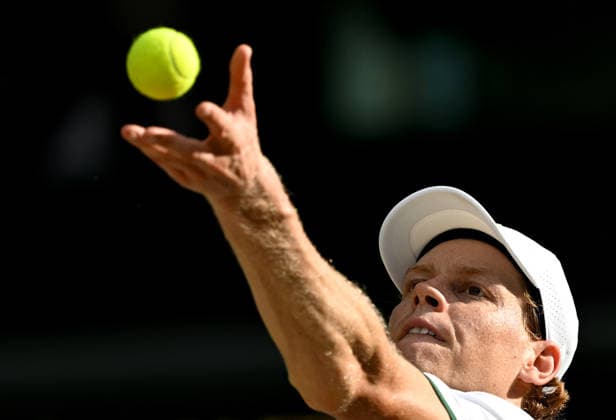 (260711) -- LONDON, July 11, 2026 -- Jannik Sinner serves during the men s singles semifinal between Jannik Sinner of Italy and Novak Djokovic of Serbia at the Wimbledon Tennis Championships in London, Britain, on July 10, 2026. ) (SP)BRITAIN-LONDON-TENNIS-WIMBLEDON-MEN S SINGLES LixYing 