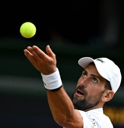 (260711) -- LONDON, July 11, 2026 -- Novak Djokovic serves during the men s singles semifinal between Jannik Sinner of Italy and Novak Djokovic of Serbia at the Wimbledon Tennis Championships in London, Britain, on July 10, 2026. ) (SP)BRITAIN-LONDON-TENNIS-WIMBLEDON-MEN S SINGLES LixYing 