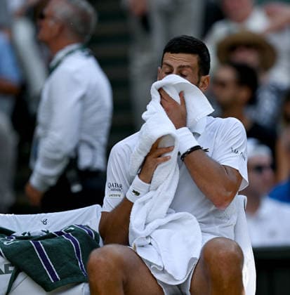 (260711) -- LONDON, July 11, 2026 -- Novak Djokovic is seen during the men s singles semifinal between Jannik Sinner of Italy and Novak Djokovic of Serbia at the Wimbledon Tennis Championships in London, Britain, on July 10, 2026. ) (SP)BRITAIN-LONDON-TENNIS-WIMBLEDON-MEN S SINGLES LixYing 