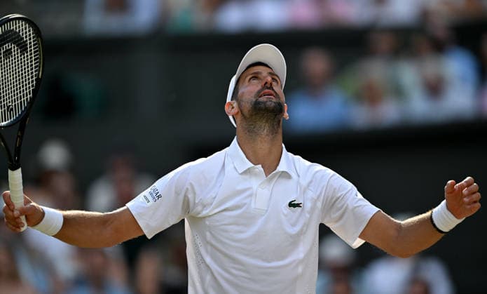 (260711) -- LONDON, July 11, 2026 -- Novak Djokovic reacts during the men s singles semifinal between Jannik Sinner of Italy and Novak Djokovic of Serbia at the Wimbledon Tennis Championships in London, Britain, on July 10, 2026. ) (SP)BRITAIN-LONDON-TENNIS-WIMBLEDON-MEN S SINGLES LixYing 